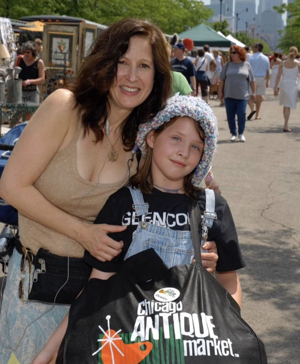 Sally Schwartz, founder of Chicago Randolph Street Market, and young fan. (Photo courtesy of Randolph Street Market)